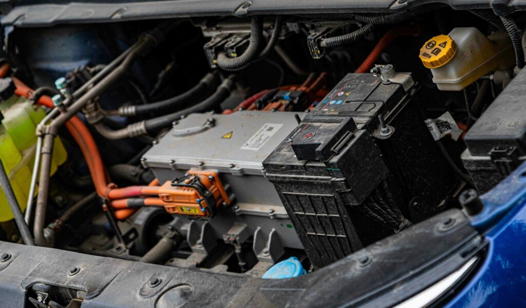 Electric car engine with visible wiring and battery components