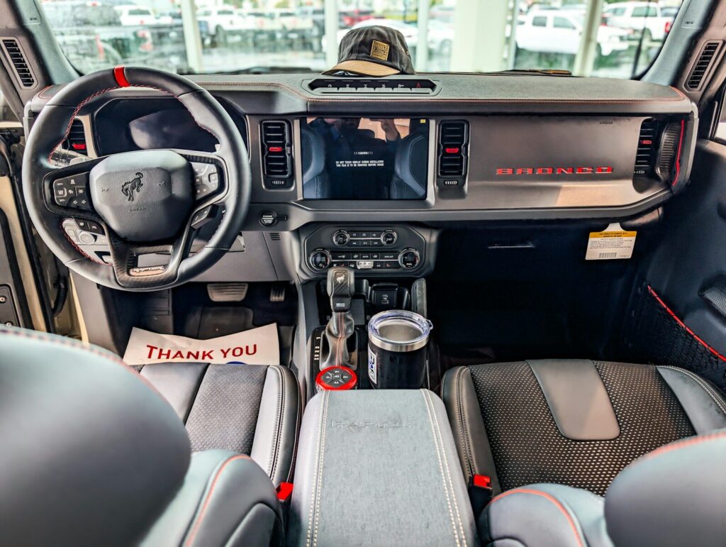 Interior of a modern suv with dashboard and dashboard details