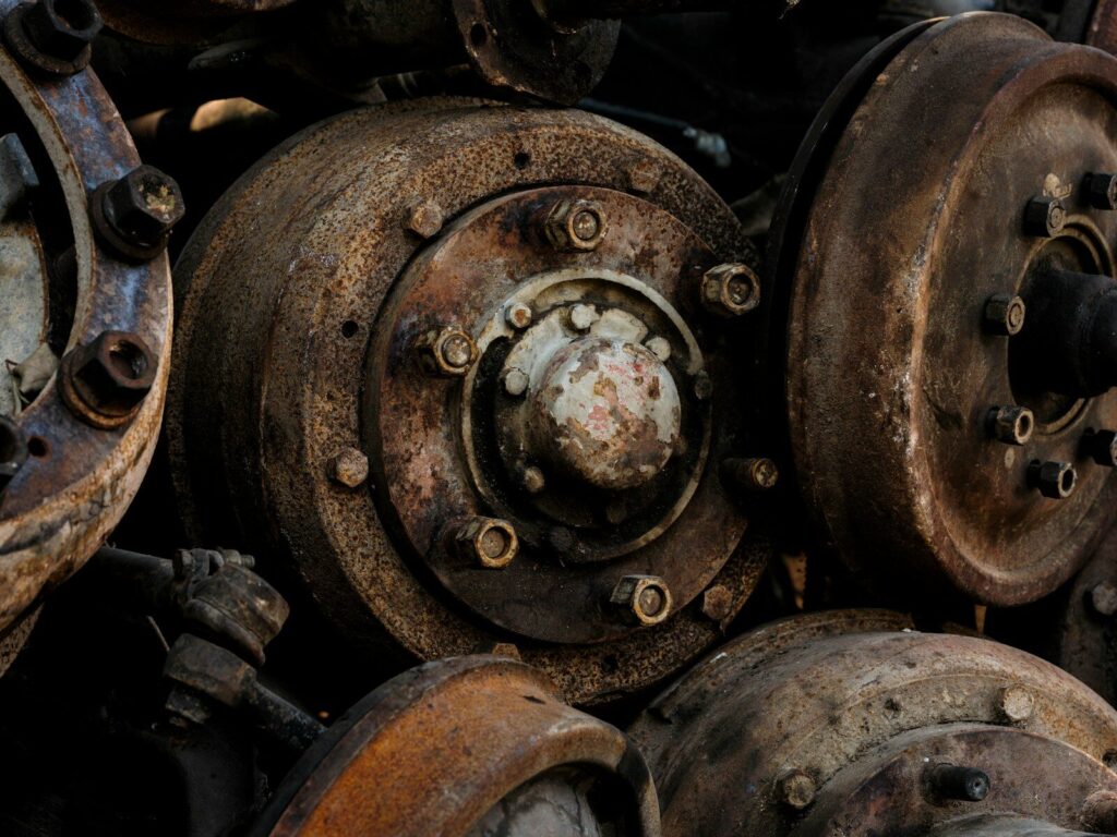 Pile of rusty old car brake drums